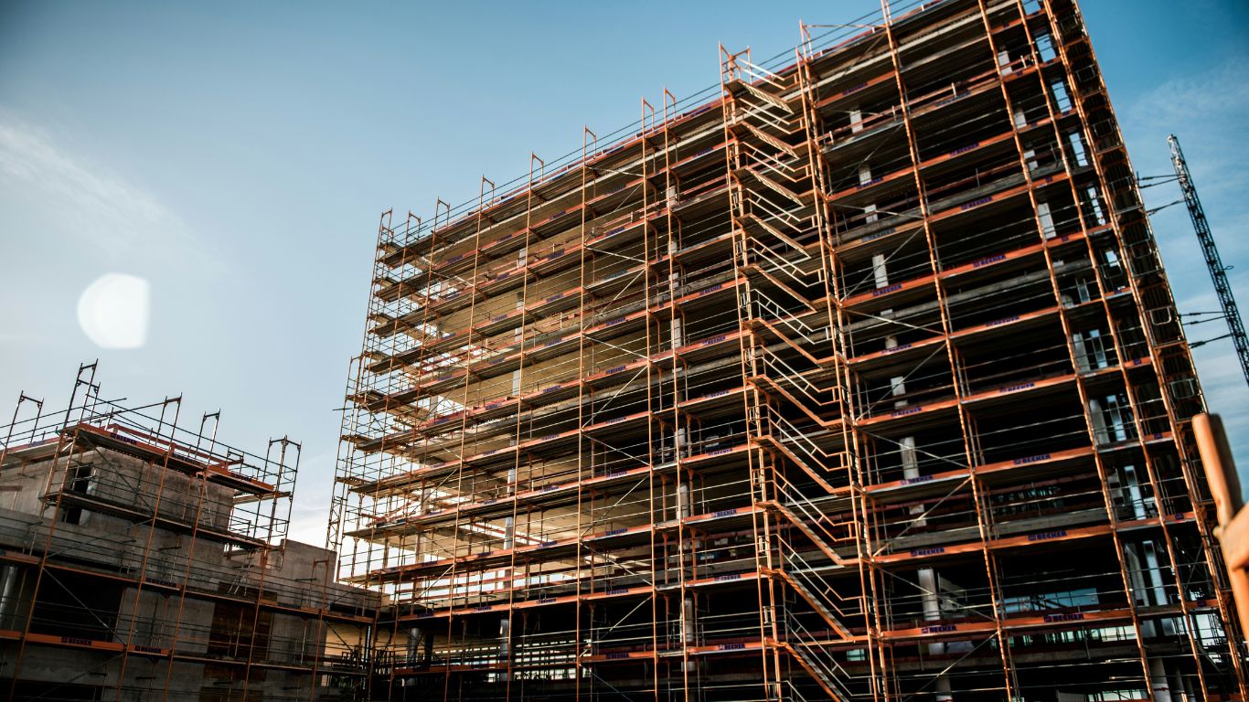 A detailed illustration of a scaffold structure at a construction site.